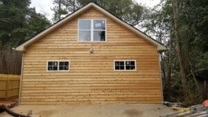 Rustic style house with new wood siding